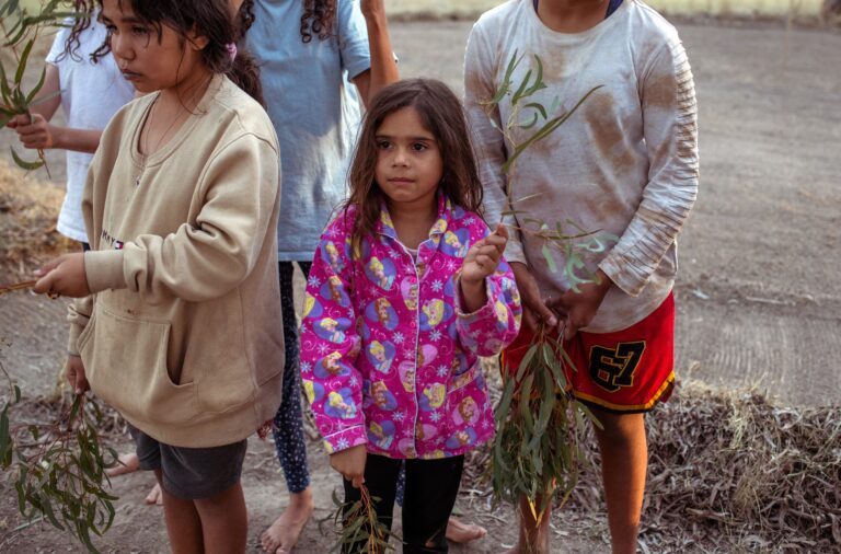 Wayilwan girls Alisha and Debbie-Lee learning Wayilwan cultural dances at Sandy Camp Corroboree Ground at Maliyangaa Ngurra Cultural Camp. December, 6, 2020.