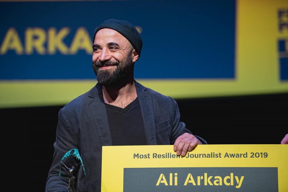 Ali Arkady accepts award.